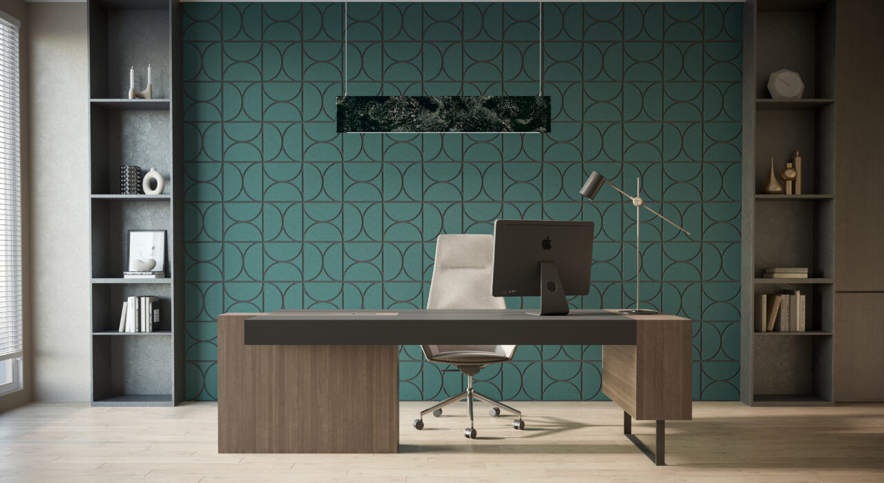 green leather faced acoustic tiles with black geometric shapes on office wall