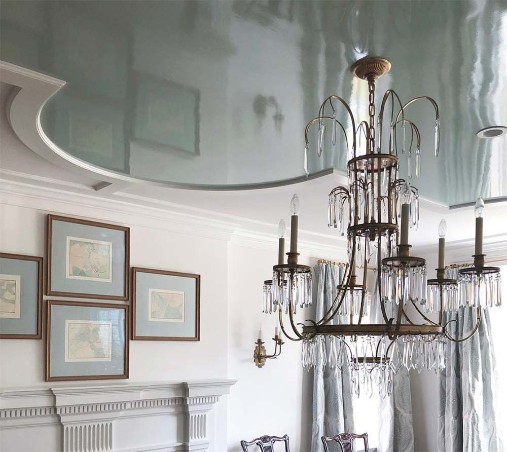 high gloss painted ceiling and chandelier