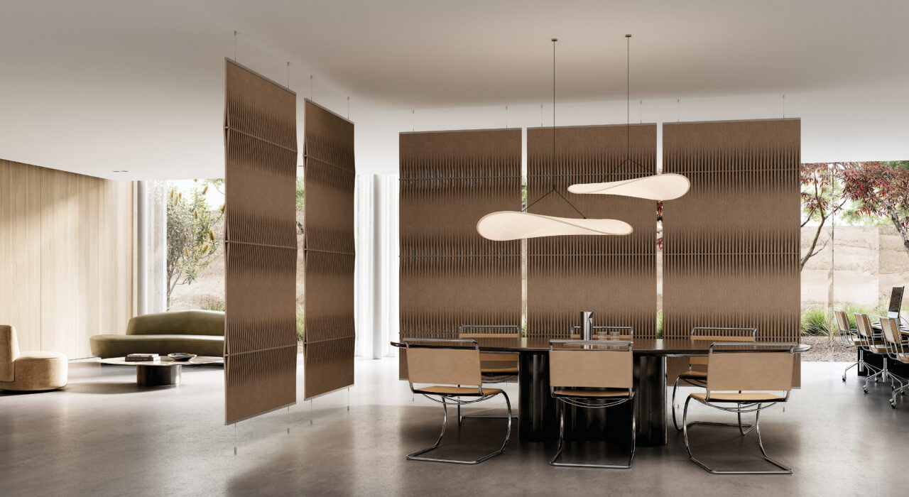 five tan suspended acoustic screens with a woven design in an open office setting