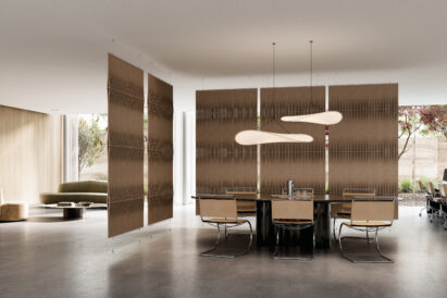 five tan suspended acoustic screens with a woven design in an open office setting