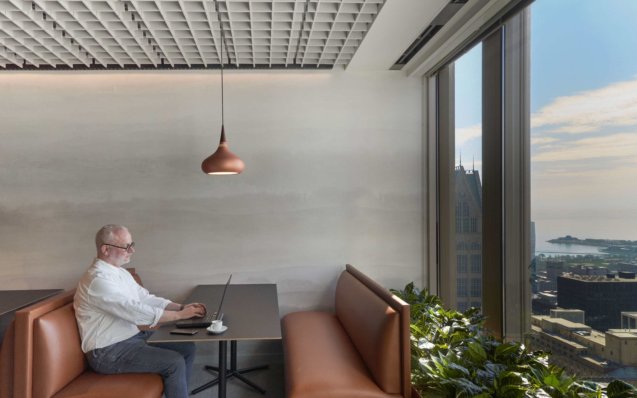 ecoustic Sculpt acoustic drop in ceiling tile in office above booth seating