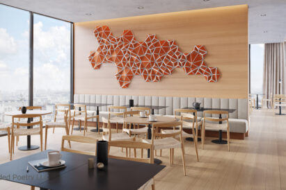 orange geometric acoustic tiles in grouping on restaurant wall