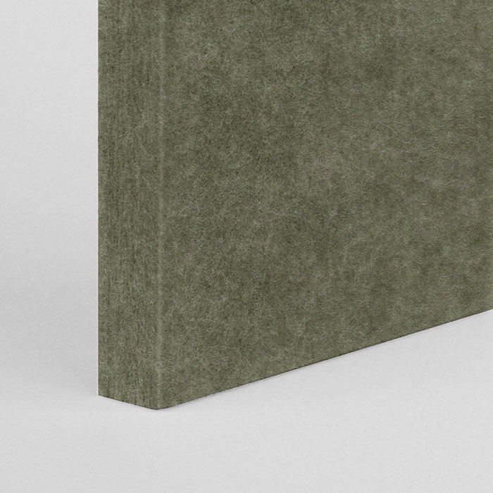 corner of olive green acoustic panel