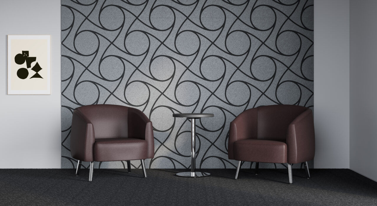 grey acoustic tiles with black geometric designs on wall