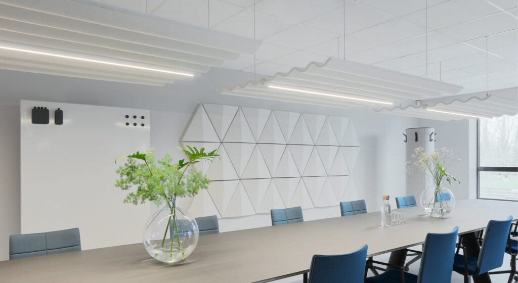 lighted ceiling tiles suspended from ceiling above conference table