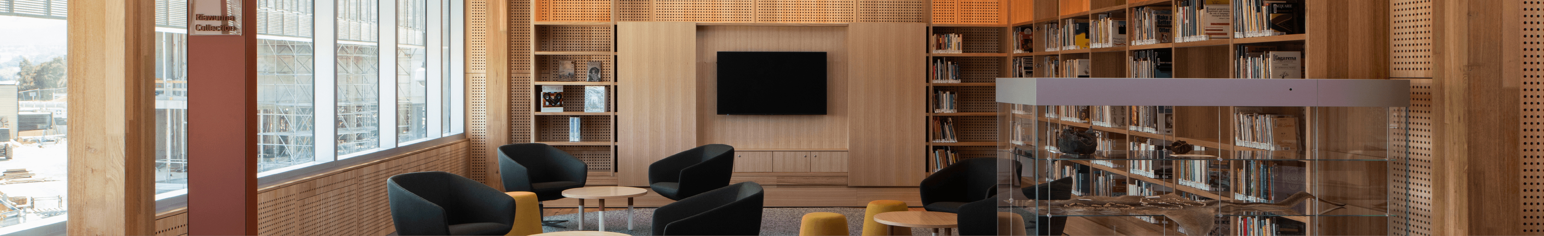 lounge area with seating in library
