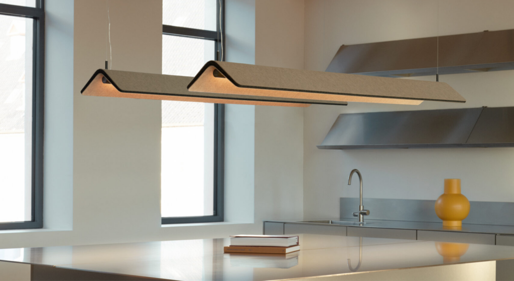 beige acoustic lighted ceiling fixtures above a countertop